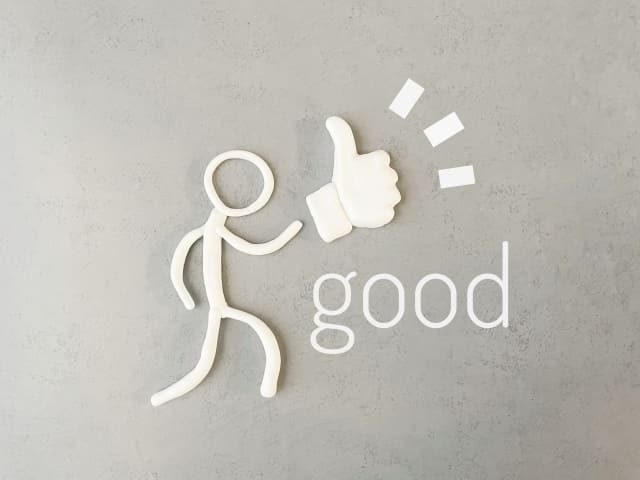 いいねのハンドサインと棒人間の画像